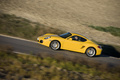 Porsche Cayman S jaune filé penché