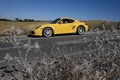 Porsche Cayman S jaune profil