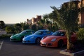 Porsche Cayman S rouge & bleu & vert 3/4 avant gauche