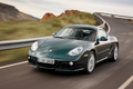 Porsche Cayman S vert 3/4 avant gauche travelling