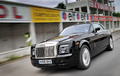Rolls Royce Phantom Coupe noir 3/4 avant gauche travelling penché