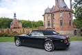 Rolls Royce Phantom Drophead Coupe noir 3/4 arrière gauche capotée