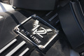 Rolls Royce Phantom Drophead Coupe noir logo V12 moteur