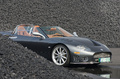 Spyker C8 Spyder anthracite Anvers charbon 3/4 avant droit caché