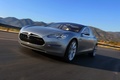 Tesla Model S gris 3/4 avant gauche travelling penché