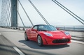 Tesla Roadster Sport rouge 3/4 avant droit travelling