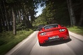 Tesla Roadster Sport rouge face arrière travelling penché