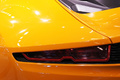 Mondial de l'Automobile Paris 2010 - Lotus Elan orange feu arrière