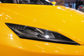Mondial de l'Automobile Paris 2010 - Lotus Elan orange phare avant