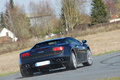 Lamborghini Gallardo LP560-4 noir 3/4 arrière droit penché