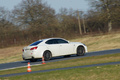 Lexus IS-F blanc 3/4 arrière droit filé penché