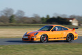 Porsche 997 GT3 RS orange 3/4 avant gauche filé