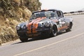 Studebaker Rovanpera, noire+orange, action, 3-4 avant droit