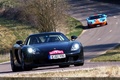 Porsche Carrera GT noir Rallye de Paris 2009 