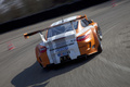 Porsche 911 GT3 R Hybrid 2011 3/4 arrière dynamique cônes