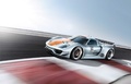Porsche 918 RSR gris/orange 3/4 avant gauche travelling penché