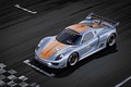 Porsche 918 RSR gris/orange 3/4 avant gauche vue de haut