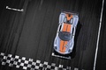 Porsche 918 RSR gris/orange vue de haut penché