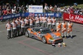 Spyker C8 Spyder GT2-R orange/gris 3/4 avant droit vue de haut équipage