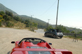 Ferrari F50 rouge face arrière penché debout