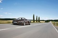 Audi R8 V8 Spyder marron 3/4 avant gauche travelling penché