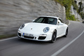 Porsche 997 Carrera GTS blanc 3/4 avant gauche travelling penché 