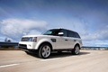 Range Rover Sport Supercharged blanc 3/4 avant gauche travelling penché