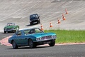 Autodrome Héritage Festival 2012 - Aston Martin DBS vert 3/4 avant droit