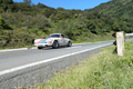 Porsche 911 blanc, action, cplongée 3-4 avg