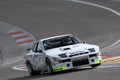 Grand Prix de l'Age d'Or 2016 - Porsche 944 blanc 3/4 avant droit penché