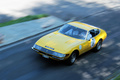 Grand Prix de Montreux 2012 - Ferrari 365 GTB/4 Daytona jaune 3/4 avant gauche filé vue de haut