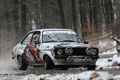 Ford Escort blanche, action 3-4 avd