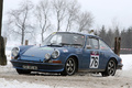 Porsche 911 bleu, action 3-4 avg