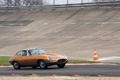 Malte à Montlhéry - Jaguar Type E marron 3/4 avant droit filé