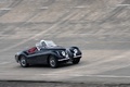 Malte à Montlhéry - Jaguar XK140 Roadster noir 3/4 avant droit filé