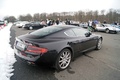 Aston Martin DB9 noir 3/4 arrière droit