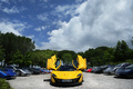 McLaren P1 jaune face avant portes ouvertes