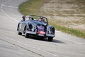 Raid Suisse-Paris 2012 - Jaguar XK150 Roadster noir 3/4 avant droit