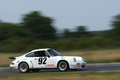 Porsche 911 Carrera 3.0 RSR blanc 3/4 avant droit filé 