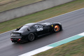 Ferrari Finali Mondiali 2011 - Mugello - 599XX noir 3/4 arrière droit filé penché vue de haut