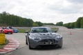 GT Prestige 2012 - Montlhéry - Aston Martin V12 Vantage anthracite face avant travelling 2