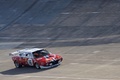 Rendez-Vous Ferrari à Montlhéry 2011 - Ferrari 308 GTB/4 rouge/blanc 3/4 avant droit filé