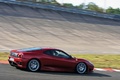 Rendez-Vous Ferrari à Montlhéry 2011 - Ferrari 360 Challenge Stradale bordeaux 3/4 arrière droit filé penché