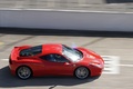 Rendez-Vous Ferrari 2012 - Ferrari 458 Italia rouge filé vue de haut