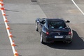 Rendez-Vous Ferrari 2012 - Ferrari 599 GTB Fiorano noir 3/4 arrière gauche filé vue de haut