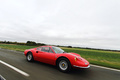 Ferrari 246 GT Dino rouge profil travelling penché 2