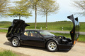 Ferrari 512 BBi noir profil capots ouverts 2