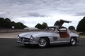 Mercedes 300 SL gris 3/4 avant gauche porte ouverte