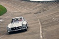 Mercedes 300 SL gris face avant travelling penché