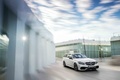 Mercedes E63 AMG Estate MY2013 blanc 3/4 avant droit travelling